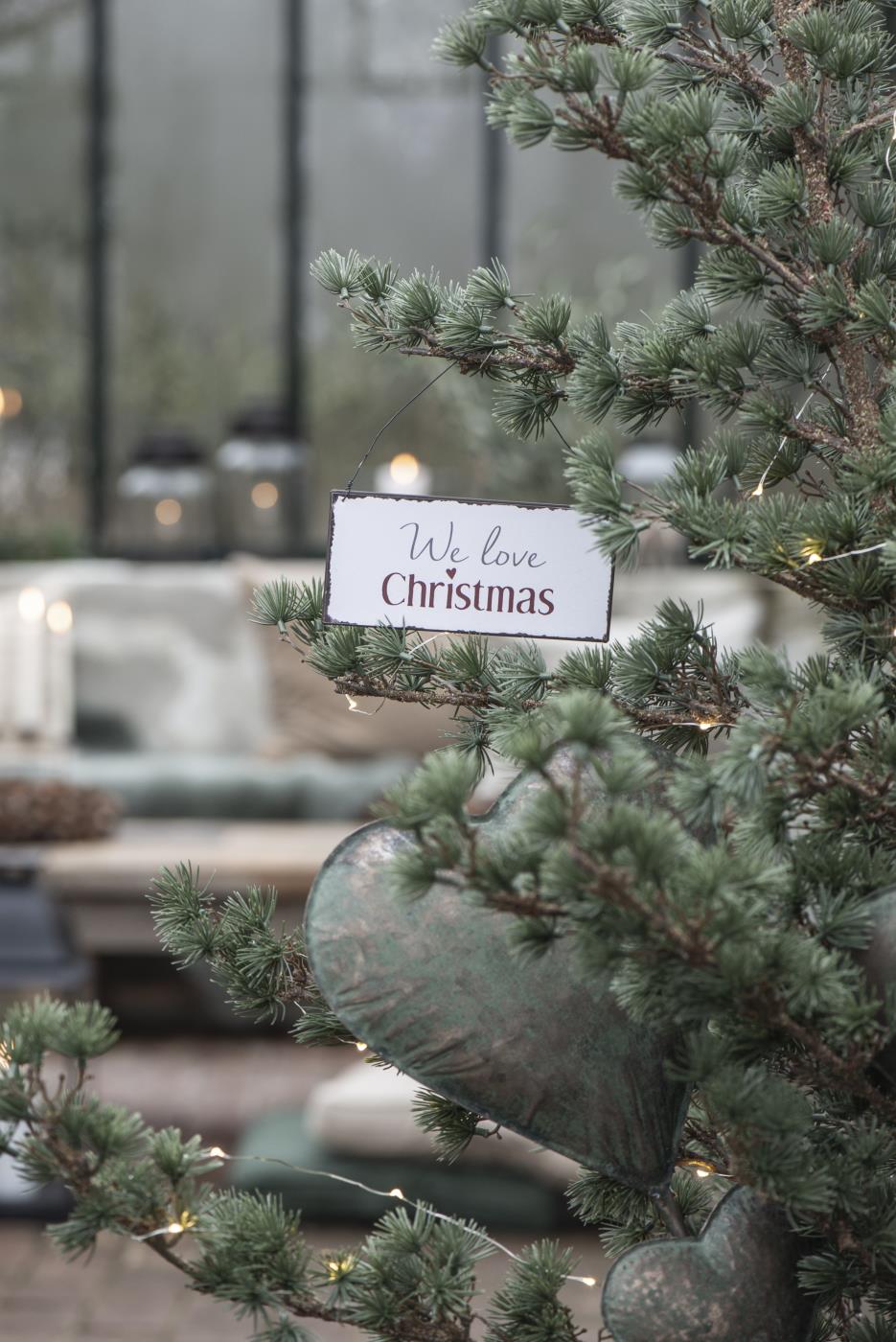 Schild "We love Christmas" Schild "We love Christmas"